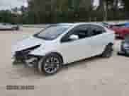 2021 Toyota Prius L Eco with VIN JTDKAMFU4M3139334, listed as a Copart auction lot 84025305 with 59,418 mi miles and Salvage title. Bid and sale history available at DreamBid. Image 1.