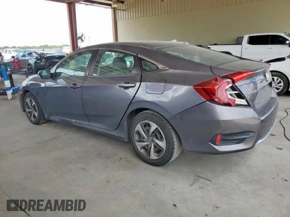 ✅ 2019 Honda Civic LX • VIN: 19XFC2F60KE041473 • Лот: 62116655. Опубликован ранее на Copart с пробегом 118 793 миль. Бесплатный доступ к архиву аукционных продаж из США и подробный отчёт об истории автомобиля на DreamBid. Изображение 2.