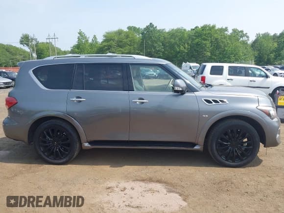 ✅ 2015 Infiniti QX80 • VIN: JN8AZ2NE8F9080456 • Lot: 42163907. Listed on IAAI with 128,064 mi. Free auction sales archive from the USA and detailed vehicle history report at DreamBid. Image 13.