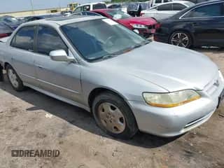 2002 Honda Accord EX с VIN 1HGCG16572A054301, выставлен на аукционе IAAI как лот 42986815 с пробегом 212 723 миль миль и . История ставок и продаж доступна на DreamBid. Изображение 1.