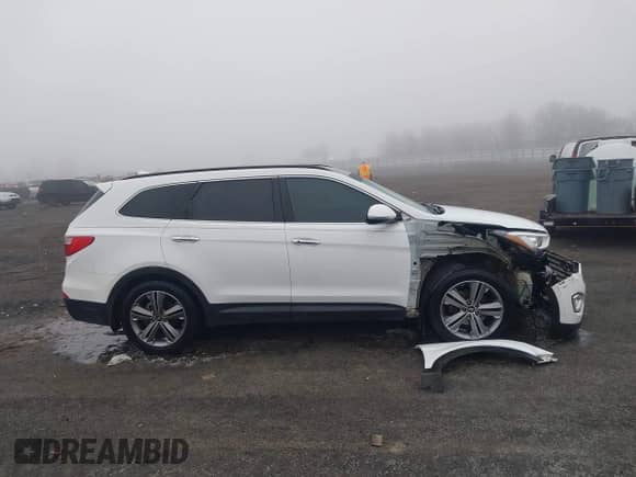 2015 Hyundai Santa Fe Limited with VIN KM8SR4HF7FU091943, listed as a IAAI auction lot 41391336 with 155,217 mi miles and . Bid and sale history available at DreamBid. Image 13.