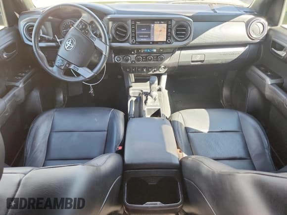 ✅ 2023 Toyota Tacoma TRD Off Road • VIN: 3TYCZ5AN1PT150821 • Lot: 80940385. Listed on Copart with 79,582 mi. Free auction sales archive from the USA and detailed vehicle history report at DreamBid. Image 8.