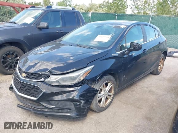 ✅ 2018 Chevrolet Cruze LT • VIN: 3G1BE6SM8JS530927 • Lot: 43137779. Listed on IAAI with 155,527 mi. Free auction sales archive from the USA and detailed vehicle history report at DreamBid. Image 2.