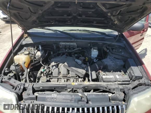 2006 Mercury Mariner Luxury z VIN 4M2YU56196DJ06804, wystawiony jako Copart lot #56183815 z przebiegiem 181 504 mil mil oraz Nie do naprawy • Non repairable. Historia ofert i sprzedaży dostępna na DreamBid. Obrazek 12.