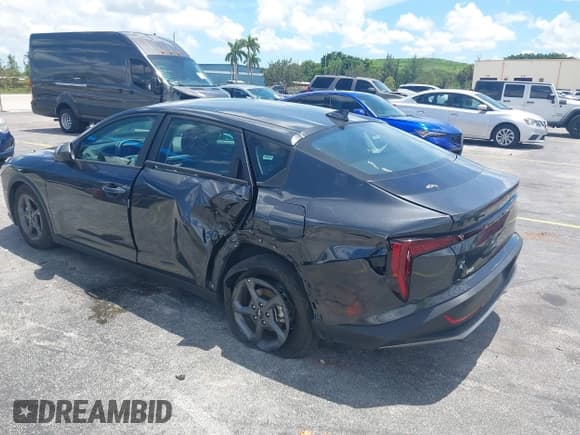 ✅ 2025 Kia K4 LXS • VIN: 3KPFT4DE1SE021125 • Lot: 43012476. Listed on IAAI with 16,563 mi. Free auction sales archive from the USA and detailed vehicle history report at DreamBid. Image 3.