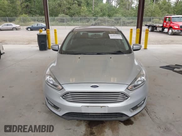 ✅ 2017 Ford Focus Titanium • VIN: 1FADP3J29HL329410 • Lot: 42493519. Listed on IAAI with 22,639 mi. Free auction sales archive from the USA and detailed vehicle history report at DreamBid. Image 12.