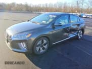 ✅ 2020 Hyundai Ioniq SEL • VIN: KMHC85LCXLU241985 • Lot: 83577344. Wystawiony na Copart z przebiegiem 56 879 mil. Bezpłatny archiwum sprzedaży aukcyjnych z USA i szczegółowy raport historii pojazdu na DreamBid. Zdjęcie 1.