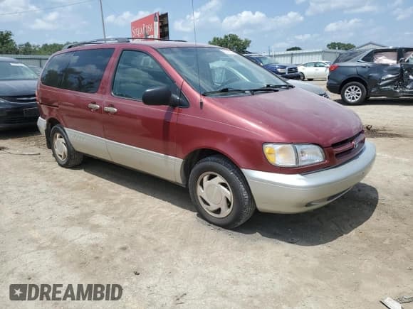✅ 1999 Toyota Sienna LE • VIN: 4T3ZF13C1XU158080 • Lot: 65145525. Listed on Copart with 181,543 mi. Free auction sales archive from the USA and detailed vehicle history report at DreamBid. Image 4.