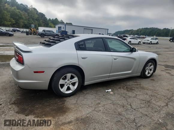 2012 Dodge Charger SE z VIN 2C3CDXBG2CH119614, wystawiony jako Copart lot #89668065 z przebiegiem 198 166 mil mil oraz Szkoda całkowita • Salvage title. Historia ofert i sprzedaży dostępna na DreamBid. Obrazek 3.