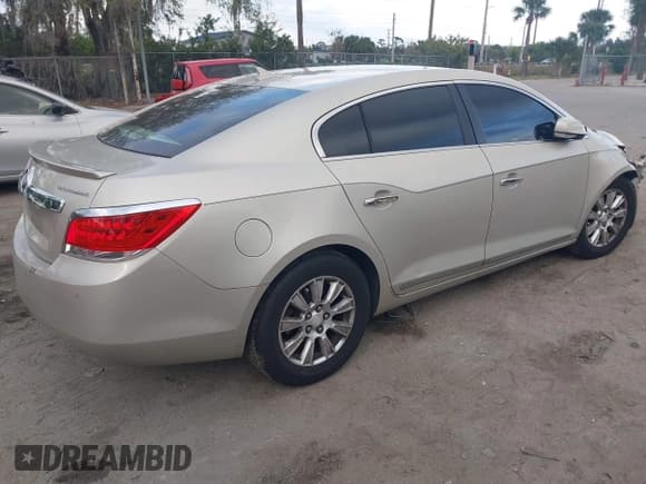 ✅ 2013 Buick LaCrosse Leather • VIN: 1G4GC5ER0DF200255 • Lot: 41609420. Listed on IAAI with 182,421 mi. Free auction sales archive from the USA and detailed vehicle history report at DreamBid. Image 4.