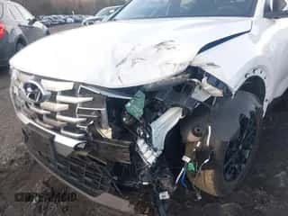 2022 Hyundai Santa Cruz SEL с VIN 5NTJBDAE0NH033592, выставлен на аукционе IAAI как лот 41126590 с пробегом 27 697 миль миль и . История ставок и продаж доступна на DreamBid. Изображение 6.