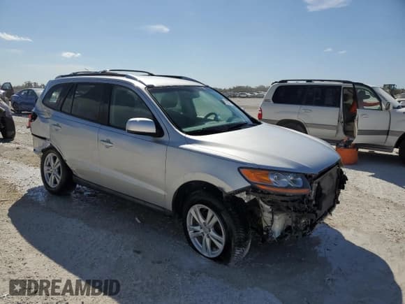 ✅ 2011 Hyundai Santa Fe SE • VIN: 5XYZH4AG8BG003096 • Lot: 74641394. Listed on Copart with 143,784 mi. Free auction sales archive from the USA and detailed vehicle history report at DreamBid. Image 4.