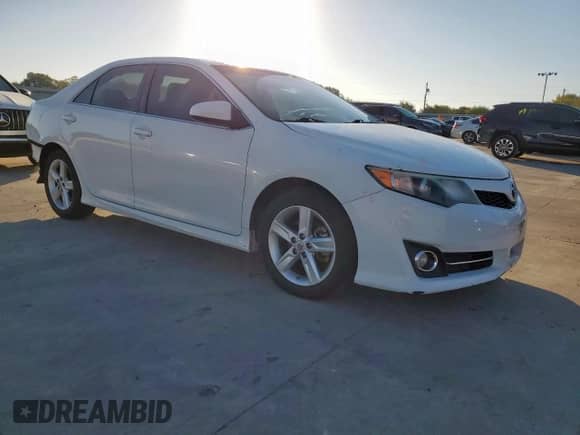 2014 Toyota Camry L with VIN 4T1BF1FK4EU744573, listed as a Copart auction lot 82307495 with 124,046 mi miles and Salvage title. Bid and sale history available at DreamBid. Image 4.