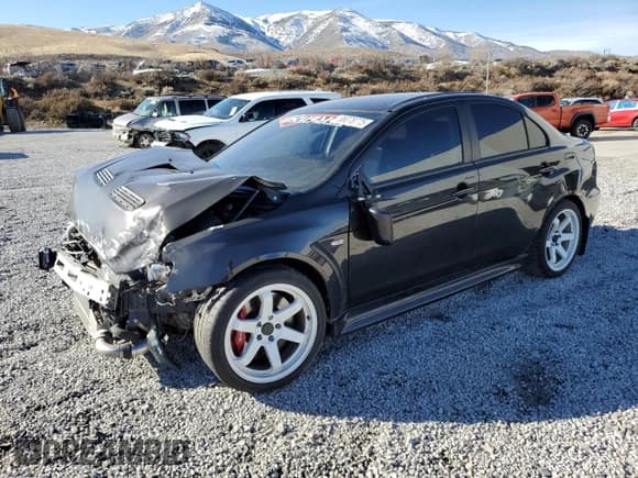 ✅ 2013 Mitsubishi Lancer Evolution GSR • VIN: JA32W8FV7DU021370 • Lot: 88078775. Listed on Copart with 61,572 mi. Free auction sales archive from the USA and detailed vehicle history report at DreamBid. Image 1.