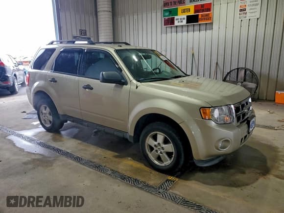 ✅ 2011 Ford Escape XLT • VIN: 1FMCU9DG0BKA91738 • Lot: 94515435. Listed on Copart with 113,109 mi. Free auction sales archive from the USA and detailed vehicle history report at DreamBid. Image 4.