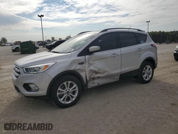 ✅ 2018 Ford Escape SEL • VIN: 1FMCU9HD7JUA57864 • Лот: 72034635. Опубликован ранее на Copart с пробегом 94 257 миль. Бесплатный доступ к архиву аукционных продаж из США и подробный отчёт об истории автомобиля на DreamBid. Изображение 1.