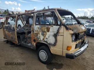 ✅ 1985 Volkswagen Vanagon GL • VIN: WV2ZB0256FH042498 • Lot: 80787914. Wystawiony na Copart z przebiegiem Nie podano. Bezpłatny archiwum sprzedaży aukcyjnych z USA i szczegółowy raport historii pojazdu na DreamBid. Zdjęcie 4.
