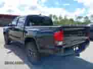 2022 Toyota Tacoma SR5 with VIN 3TMAZ5CN4NM164094, listed as a IAAI auction lot 43409274 with 38,585 mi miles and . Bid and sale history available at DreamBid. Image 3.