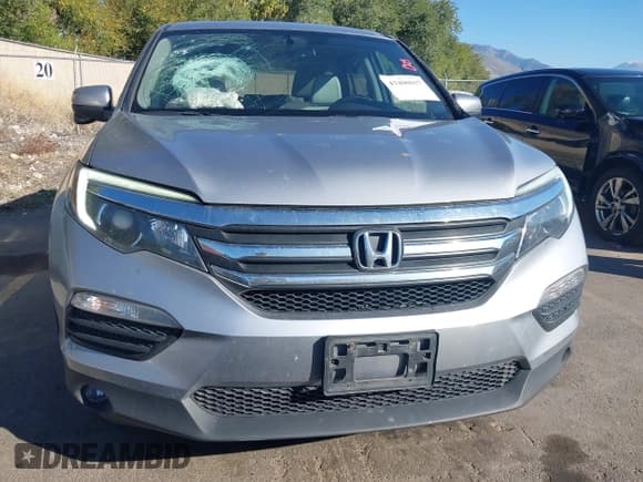 ✅ 2018 Honda Pilot EX-L • VIN: 5FNYF6H5XJB013667 • Lot: 43400037. Listed on IAAI with 111,947 mi. Free auction sales archive from the USA and detailed vehicle history report at DreamBid. Image 12.
