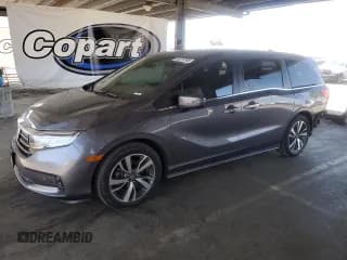 ✅ 2022 Honda Odyssey Touring • VIN: 5FNRL6H80NB015540 • Lot: 69278785. Wystawiony na Copart z przebiegiem 65 810 mil. Bezpłatny archiwum sprzedaży aukcyjnych z USA i szczegółowy raport historii pojazdu na DreamBid. Zdjęcie 1.