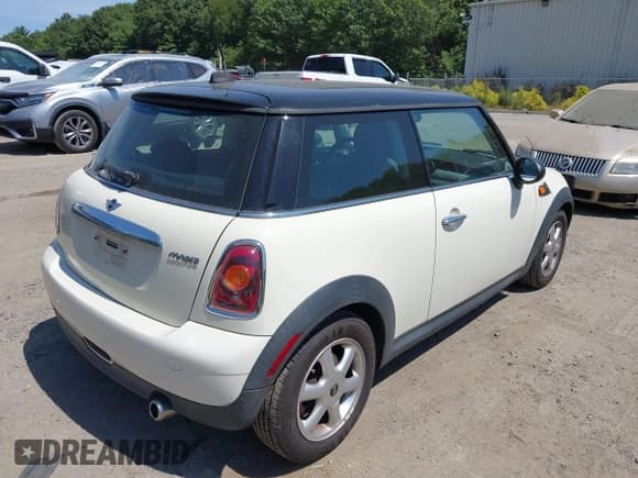 ✅ 2009 MINI Hardtop • VIN: WMWMF33519TU70832 • Lot: 42902421. Listed on IAAI with 88,144 mi. Free auction sales archive from the USA and detailed vehicle history report at DreamBid. Image 4.