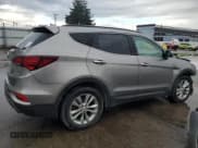 ✅ 2018 Hyundai Santa Fe Limited • VIN: 5XYZUDLA7JG512731 • Лот: 84942364. Опубликован ранее на Copart с пробегом 79 192 миль. Бесплатный доступ к архиву аукционных продаж из США и подробный отчёт об истории автомобиля на DreamBid. Изображение 3.