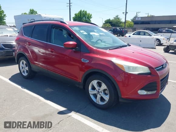 ✅ 2014 Ford Escape SE • VIN: 1FMCU9GX3EUB64623 • Lot: 42560923. Listed on IAAI with 120,730 mi. Free auction sales archive from the USA and detailed vehicle history report at DreamBid. Image 1.