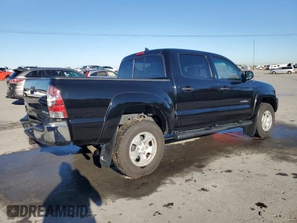 ✅ 2012 Toyota Tacoma • VIN: 3TMLU4EN5CM086033 • Lot: 87375995. Listed on Copart with 100,692 mi. Free auction sales archive from the USA and detailed vehicle history report at DreamBid. Image 3.