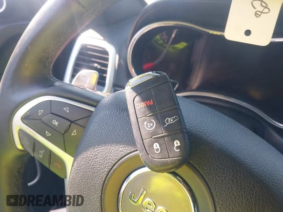 ✅ 2016 Jeep Grand Cherokee Overland • VIN: 1C4RJFCT6GC471673 • Lot: 40584190. Listed on IAAI with 128,482 mi. Free auction sales archive from the USA and detailed vehicle history report at DreamBid. Image 11.