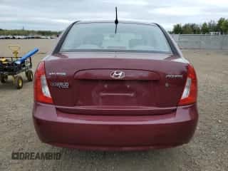 2009 Hyundai Accent L z VIN KMHCN45C89U326039, wystawiony jako Copart lot #74818154 z przebiegiem 136 486 mil mil oraz Czysty tytuł • Clean title. Historia ofert i sprzedaży dostępna na DreamBid. Obrazek 6.
