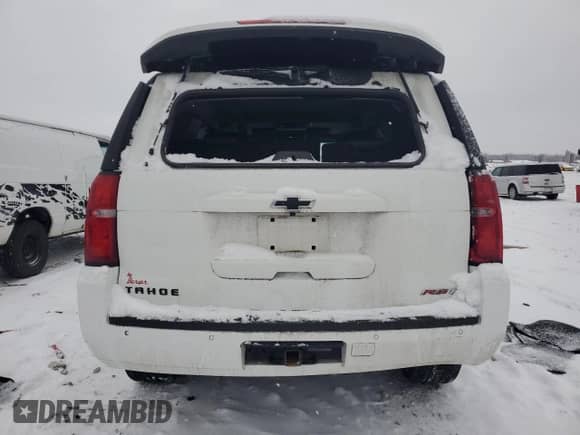 2020 Chevrolet Tahoe Premier with VIN 1GNSKCKJXLR182971, listed as a Copart auction lot 87268634 with 210,000 mi miles and Salvage title. Bid and sale history available at DreamBid. Image 6.