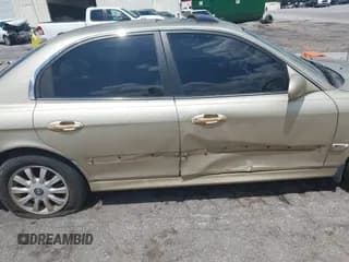 ✅ 2004 Hyundai Sonata GLS • VIN: KMHWF35H84A949445 • Lot: 42625773. Listed on IAAI with 214,665 mi. Free auction sales archive from the USA and detailed vehicle history report at DreamBid. Image 6.