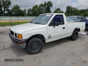 ✅ 1990 Isuzu Pickup S • VIN: JAACL11L5L7216514 • Lot: 63790965. Wystawiony na Copart z przebiegiem 130 668 mil. Bezpłatny archiwum sprzedaży aukcyjnych z USA i szczegółowy raport historii pojazdu na DreamBid. Zdjęcie 1.