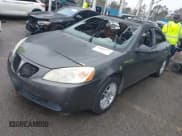 ✅ 2005 Pontiac G6 • VIN: 1G2ZG528354114758 • Lot: 41803541. Listed on IAAI with Not provided. Free auction sales archive from the USA and detailed vehicle history report at DreamBid. Image 2.