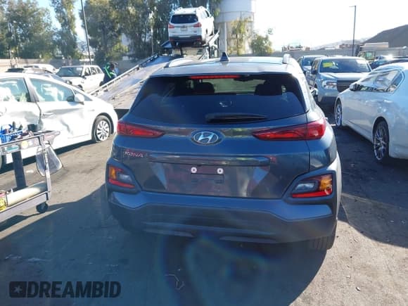 ✅ 2019 Hyundai Kona SEL • VIN: KM8K62AA1KU369063 • Лот: 43496381. Опубликован ранее на IAAI с пробегом 56 663 миль. Бесплатный доступ к архиву аукционных продаж из США и подробный отчёт об истории автомобиля на DreamBid. Изображение 17.