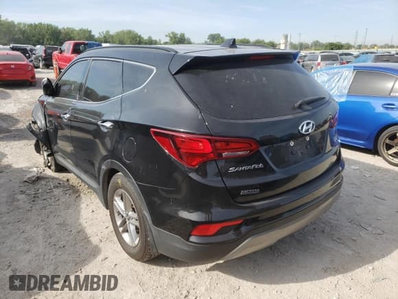 ✅ 2018 Hyundai Santa Fe 2.4L • VIN: 5NMZUDLB1JH063089 • Лот: 57906162. Опубликован ранее на Copart с пробегом 83 722 миль. Бесплатный доступ к архиву аукционных продаж из США и подробный отчёт об истории автомобиля на DreamBid. Изображение 3.