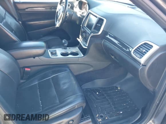 ✅ 2015 Jeep Grand Cherokee Overland • VIN: 1C4RJFCGXFC215750 • Лот: 40795135. Опубликован ранее на IAAI с пробегом 89 110 миль. Бесплатный доступ к архиву аукционных продаж из США и подробный отчёт об истории автомобиля на DreamBid. Изображение 5.