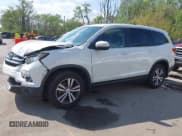 ✅ 2018 Honda Pilot EX-L • VIN: 5FNYF6H57JB045332 • Lot: 42064344. Listed on IAAI with 140,129 mi. Free auction sales archive from the USA and detailed vehicle history report at DreamBid. Image 2.