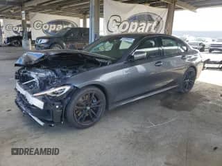2022 BMW 3 Series M340i with VIN 3MW5U7J0XN8C39888, listed as a Copart auction lot 82389045 with 23,292 mi miles and Salvage title. Bid and sale history available at DreamBid. Image 1.
