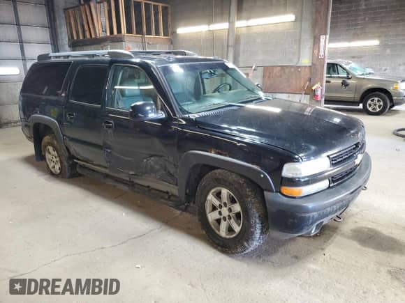 2005 Chevrolet Suburban Z71 с VIN 3GNFK16Z65G248165, выставлен на аукционе Copart как лот 77935724 с пробегом 239 109 миль миль и Списание • Salvage title. История ставок и продаж доступна на DreamBid. Изображение 4.
