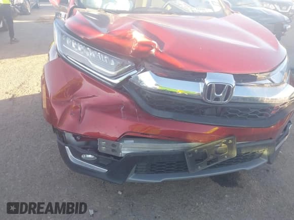 ✅ 2019 Honda CR-V Touring • VIN: 2HKRW1H94KH502563 • Lot: 43573536. Listed on IAAI with 42,050 mi. Free auction sales archive from the USA and detailed vehicle history report at DreamBid. Image 6.