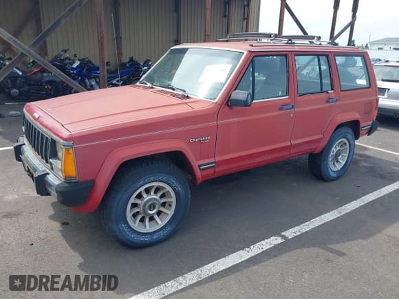 ✅ 1989 Jeep Cherokee • VIN: 1J4FT38L3KL577747 • Lot: 42577047. Listed on IAAI with 144,312 mi. Free auction sales archive from the USA and detailed vehicle history report at DreamBid. Image 2.
