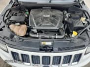 ✅ 2015 Jeep Grand Cherokee Overland • VIN: 1C4RJFCM9FC866700 • Lot: 86303435. Listed on Copart with 86,831 mi. Free auction sales archive from the USA and detailed vehicle history report at DreamBid. Image 12.