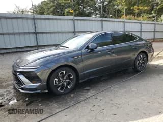 ✅ 2025 Hyundai Sonata SEL • VIN: KMHL64JA0SA481791 • Лот: 85490895. Опубликован ранее на Copart с пробегом 10 411 миль. Бесплатный доступ к архиву аукционных продаж из США и подробный отчёт об истории автомобиля на DreamBid. Изображение 1.