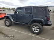✅ 2007 Jeep Wrangler Unlimited Sahara • VIN: 1J4GB59107L184277 • Lot: 84781475. Listed on Copart with 264,496 mi. Free auction sales archive from the USA and detailed vehicle history report at DreamBid. Image 2.