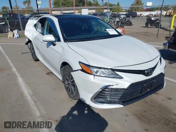 ✅ 2021 Toyota Camry XLE • VIN: 4T1F11AK4MU521939 • Lot: 43623462. Listed on IAAI with 48,425 mi. Free auction sales archive from the USA and detailed vehicle history report at DreamBid. Image 1.