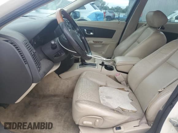 ✅ 2005 Cadillac CTS • VIN: 1G6DP567750141057 • Lot: 90453575. Listed on Copart with 203,850 mi. Free auction sales archive from the USA and detailed vehicle history report at DreamBid. Image 7.