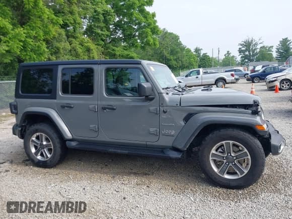 ✅ 2022 Jeep Wrangler Unlimited Sahara • VIN: 1C4HJXEN2NW239826 • Lot: 42497327. Listed on IAAI with 36,754 mi. Free auction sales archive from the USA and detailed vehicle history report at DreamBid. Image 12.