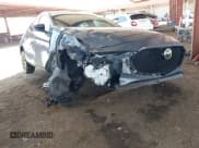 ✅ 2024 Mazda 3 S Carbon Edition • VIN: JM1BPBLM8R1650524 • Lot: 42477028. Wystawiony na IAAI z przebiegiem 41 303 mil. Bezpłatny archiwum sprzedaży aukcyjnych z USA i szczegółowy raport historii pojazdu na DreamBid. Zdjęcie 1.