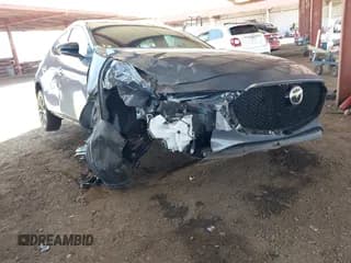 ✅ 2024 Mazda 3 S Carbon Edition • VIN: JM1BPBLM8R1650524 • Lot: 42477028. Listed on IAAI with 41,303 mi. Free auction sales archive from the USA and detailed vehicle history report at DreamBid. Image 1.